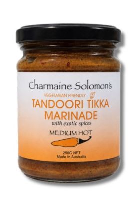 Charmaine Solomon curry pastes, marinades and spice blends displayed in a retail store, with distrib