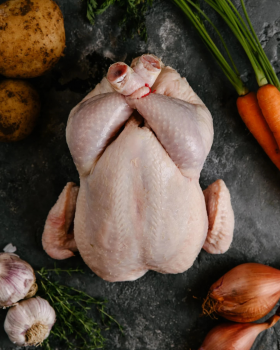 Raw beef cuts including steaks and ribs on a board with herbs and spices, representing Melbourne Mea