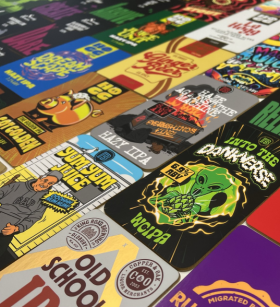 Australian label printing production line with custom branded product labels on rolls, showcasing Br