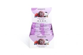 Nourishing By Sally Assorted coconut protein balls in bowl including chocolate, raspberry and vanill