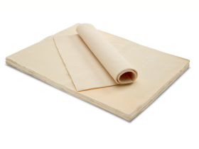 Gluten-free layered cake by Melinda’s Gluten Free Goodies, featuring a frosted sponge cake displayed