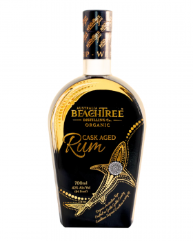 Beachtree Ocean Blue gin liqueur bottle displayed beside a koala holding a purple cocktail at a beac