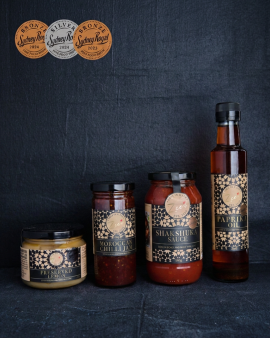 Award-winning Zee's Love In A Jar Shakshuka Sauce served with baked eggs, showcasing Australian-made
