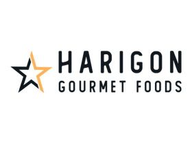 Harigon Gourmet Foods black caviar and red caviar in crystal bowls with crepes on a white tablecloth