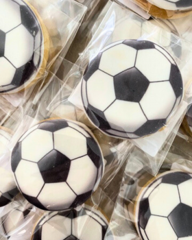 Artisan Delights logo with text reading “Iced Gingerbread Cookies” and “Custom Promotional Cookies”