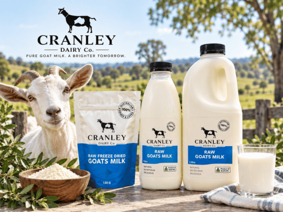 Cranley Dairy Co. raw goat milk and freeze-dried goat milk products displayed with a dairy goat in a