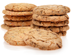 Gluten-free layered cake by Melinda’s Gluten Free Goodies, featuring a frosted sponge cake displayed