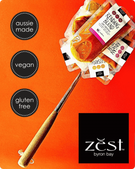 Zest Byron Bay spice pastes and curry blends displayed on a pink background with the brand logo.