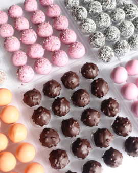 Nourishing By Sally contract manufacturing of wholefood prote balls in coconut and cacao varieties,