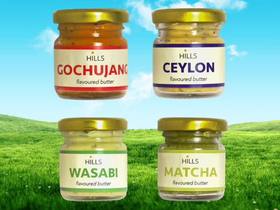 Four Hills Butter flavoured butter varieties in glass jars, including Gochujang, Ceylon, Wasabi and