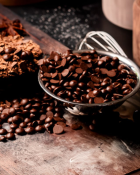 Luxury gift box of assorted Belgian Delights chocolates presented in a gold-trimmed box with ribbon