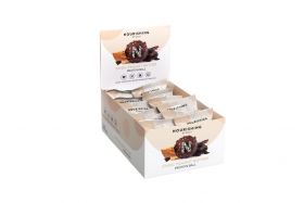 Nourishing By Sally Assorted coconut protein balls in bowl including chocolate, raspberry and vanill