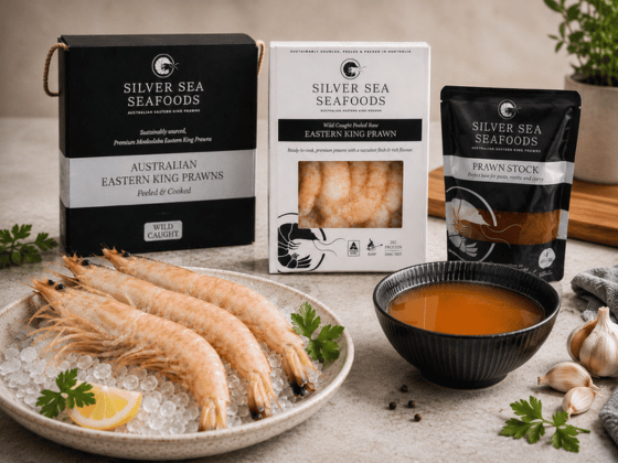 Silver Sea Seafoods Australian Eastern King Prawn retail packs displayed with fresh prawns on ice an