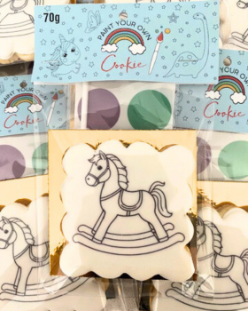 Artisan Delights logo with text reading “Iced Gingerbread Cookies” and “Custom Promotional Cookies”