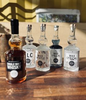 HHH Spirits range of bottles including Single Malt Whisky, Vodka, Miss Myrtle Gin, KLC Gin, Wax Lyri