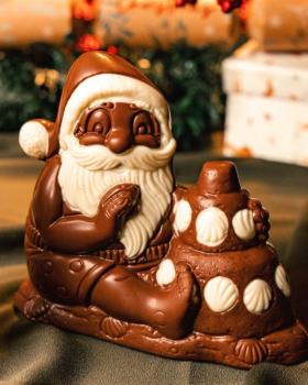 Luxury gift box of assorted Belgian Delights chocolates presented in a gold-trimmed box with ribbon