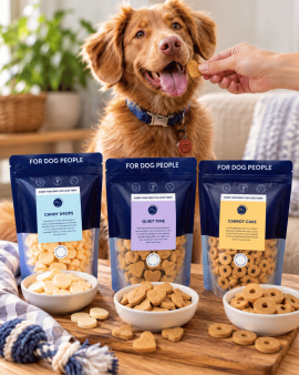 K9 Katering wholesale dog treats displayed in branded retail packs and jars at a butcher shop, with