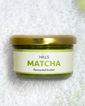 Four Hills Butter flavoured butter varieties in glass jars, including Gochujang, Ceylon, Wasabi and