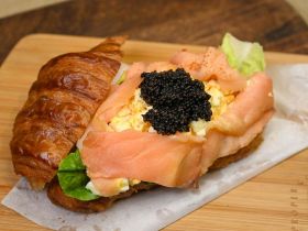 World-class caviar served on a gourmet dish with salmon and herrings, showcasing Harigon Gourmet Foo