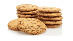 Gluten-free layered cake by Melinda’s Gluten Free Goodies, featuring a frosted sponge cake displayed