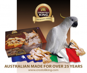 Bowl of Crostoli King crostoli pastries dusted with icing sugar, showcasing thin, crispy Italian swe