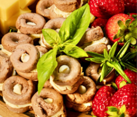 Assorted Continental Tarallini savoury crackers in various flavours arranged on a white table with a