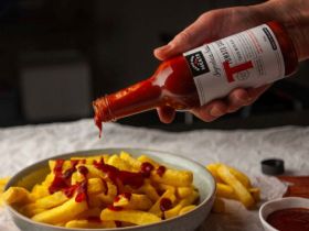Maple Leaf Meats logo featuring Canadian maple leaf and the words ‘Signature Sauce’ – Australian-mad