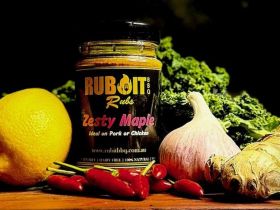 Rub It BBQ Lazy Lamb seasoning jar with grilled lamb chop, fresh parsley, garlic, onion and herbs di