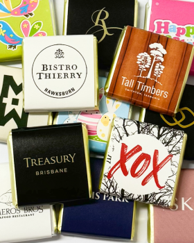 Luxury gift box of assorted Belgian Delights chocolates presented in a gold-trimmed box with ribbon