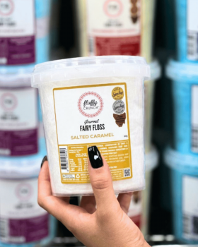 Fluffy Crunch gourmet fairy floss branding over pink and white fairy floss background