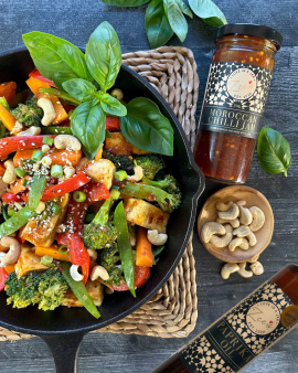 Award-winning Zee's Love In A Jar Shakshuka Sauce served with baked eggs, showcasing Australian-made