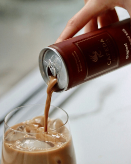 Three varieties of Cafeda Vietnamese iced coffee, Coconut Milk, Caramel and Condensed Milk, served c