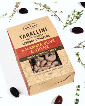 Assorted Continental Tarallini savoury crackers in various flavours arranged on a white table with a