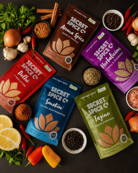 Secret Spice Co certified organic spice blends and seasonings in reusable glass jars and refill pouc