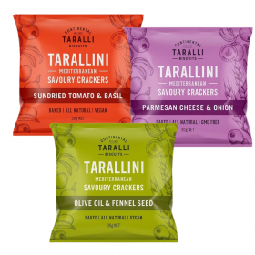 Assorted Continental Tarallini savoury crackers in various flavours arranged on a white table with a