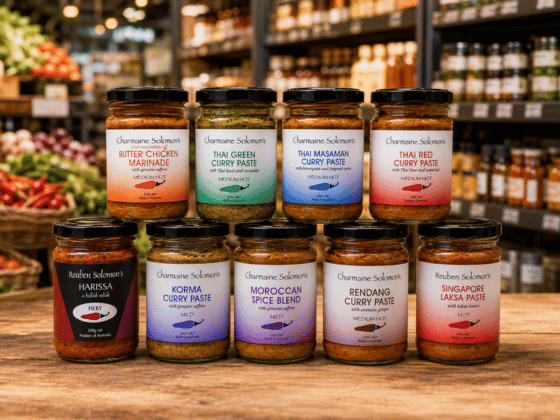 Charmaine Solomon curry pastes, marinades and spice blends displayed in a retail store, with distrib