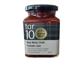 tar10 caramelised balsamic vinegar being drizzled over cheese and bread on a charcuterie board