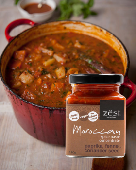 Zest Byron Bay spice pastes and curry blends displayed on a pink background with the brand logo.