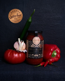 Award-winning Zee's Love In A Jar Shakshuka Sauce served with baked eggs, showcasing Australian-made