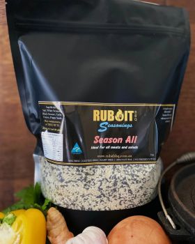 Rub It BBQ Lazy Lamb seasoning jar with grilled lamb chop, fresh parsley, garlic, onion and herbs di