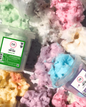 Fluffy Crunch gourmet fairy floss branding over pink and white fairy floss background