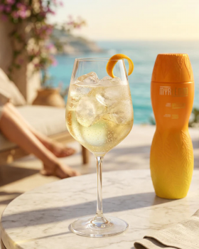 Myrlemon Australian botanical spirit bottle with lemon myrtle and citrus, displayed by the beach sho