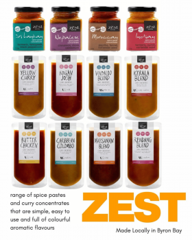 Zest Byron Bay spice pastes and curry blends displayed on a pink background with the brand logo.