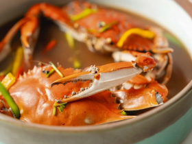 Antarctic Royal Seafood Sardine Garum Umami Dust beside grilled steak finished with a creamy sauce.