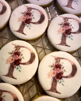 Artisan Delights logo with text reading “Iced Gingerbread Cookies” and “Custom Promotional Cookies”