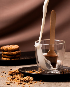 Luxury gift box of assorted Belgian Delights chocolates presented in a gold-trimmed box with ribbon