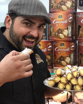 Bowl of Crostoli King crostoli pastries dusted with icing sugar, showcasing thin, crispy Italian swe