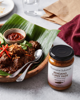 Charmaine Solomon curry pastes, marinades and spice blends displayed in a retail store, with distrib
